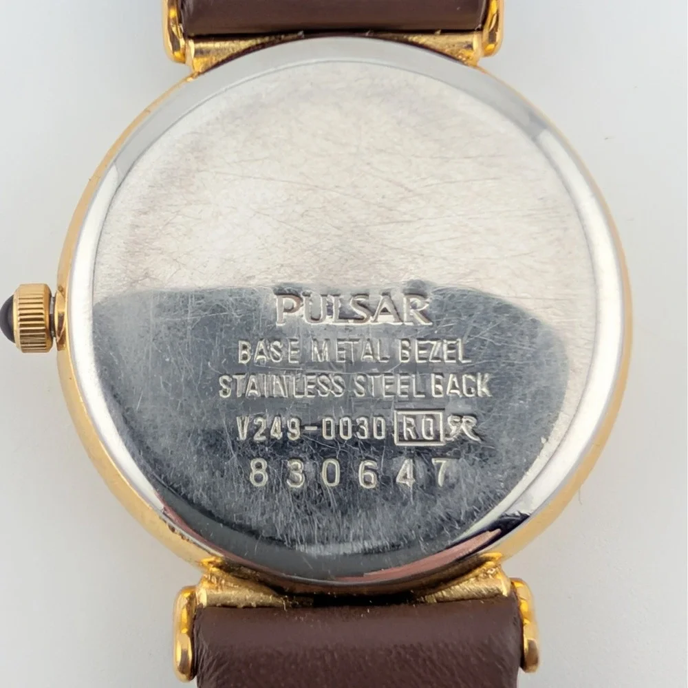 Pulsar V249-0030 Date Pointer Gold Tone White Dial Brown Leather Women's Watch